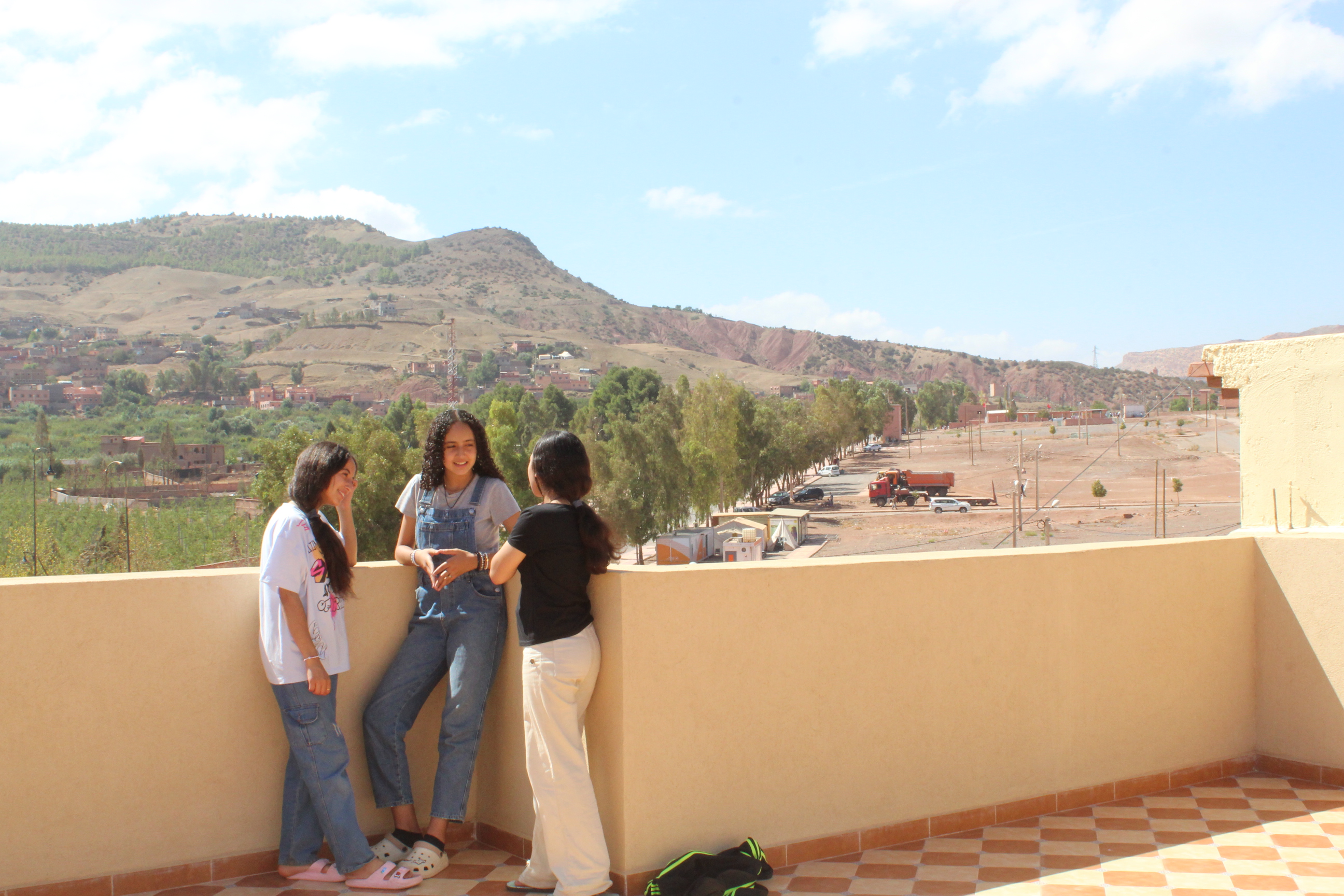 Three women on a terrace in the Middle East